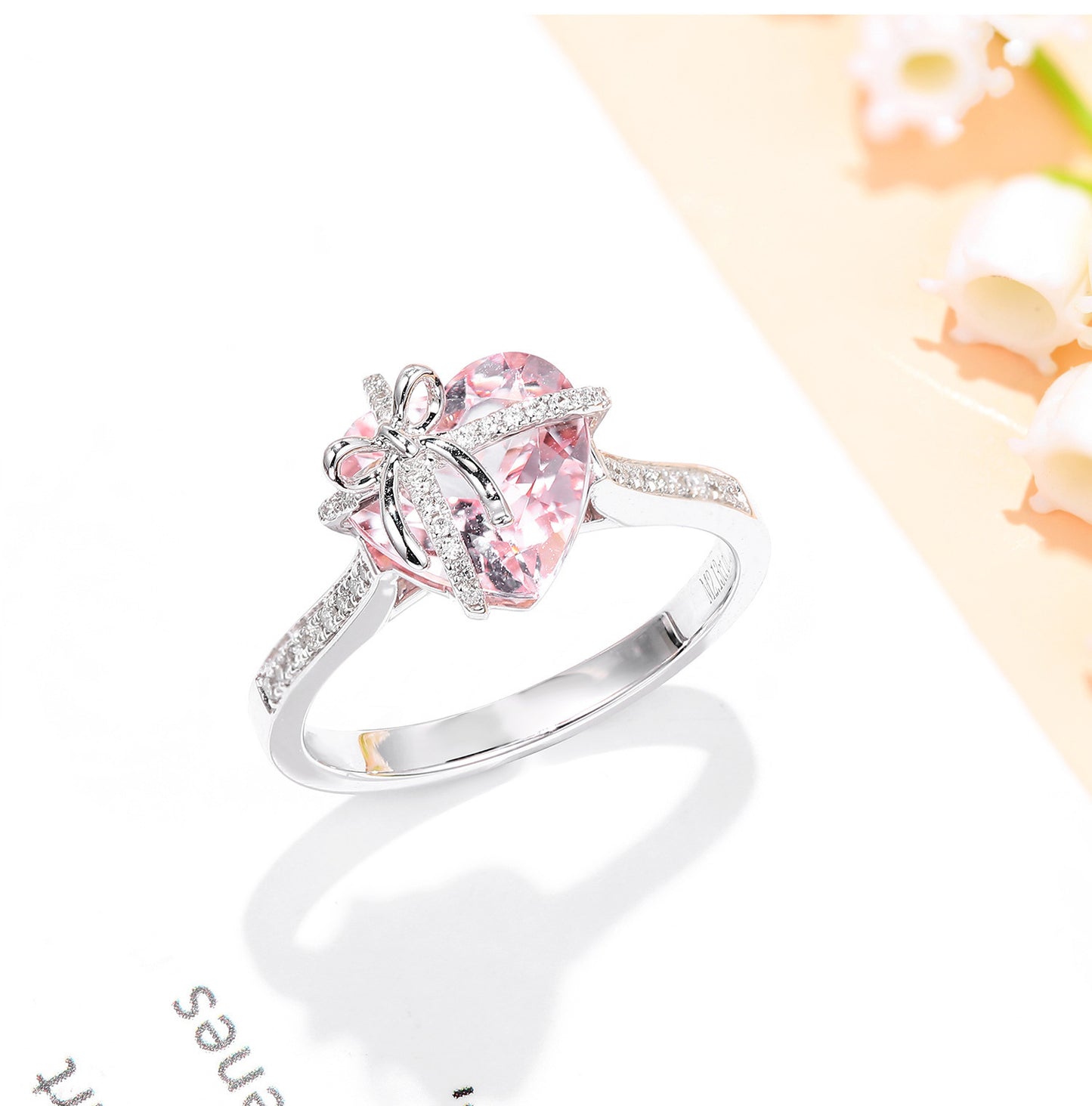 The Tied with Love Ring is a masterpiece of high-design fairy aesthetics, featuring a stunning heart-shaped pink diamond elegantly bound by a shimmering zircon-encrusted knot.
