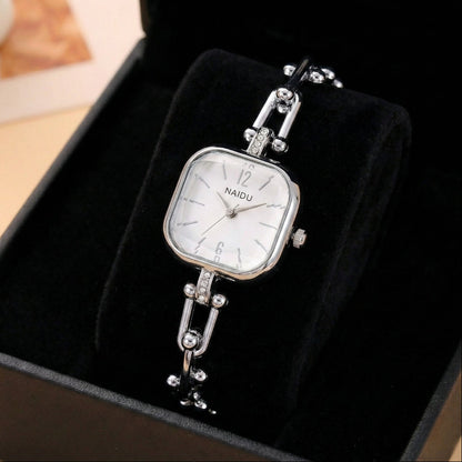 The Elite Eternity Watch redefines elegance with its sophisticated square small dial and a light luxury Cuban-inspired strap. This timepiece seamlessly blends the bold aesthetic of a high-end bracelet with the precision of a modern quartz movement, making it a standout accessory for any trendsetting wardrobe.