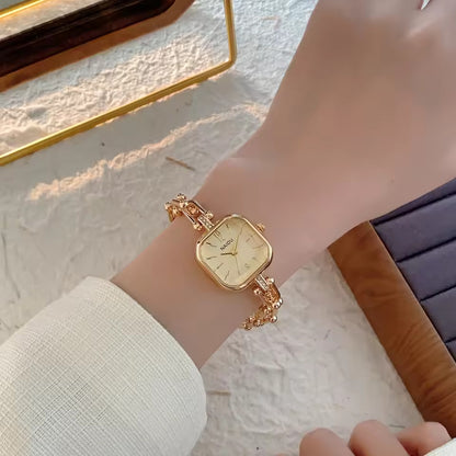 The Elite Eternity Watch redefines elegance with its sophisticated square small dial and a light luxury Cuban-inspired strap. This timepiece seamlessly blends the bold aesthetic of a high-end bracelet with the precision of a modern quartz movement, making it a standout accessory for any trendsetting wardrobe.