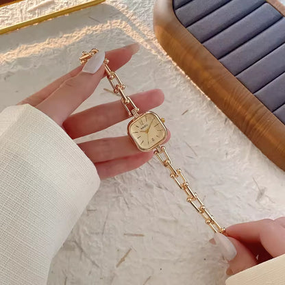 The Elite Eternity Watch redefines elegance with its sophisticated square small dial and a light luxury Cuban-inspired strap. This timepiece seamlessly blends the bold aesthetic of a high-end bracelet with the precision of a modern quartz movement, making it a standout accessory for any trendsetting wardrobe.