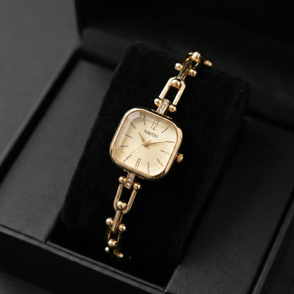 The Elite Eternity Watch redefines elegance with its sophisticated square small dial and a light luxury Cuban-inspired strap. This timepiece seamlessly blends the bold aesthetic of a high-end bracelet with the precision of a modern quartz movement, making it a standout accessory for any trendsetting wardrobe.