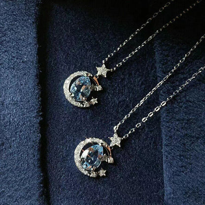 The Moondust Whisper Necklace captures the ethereal beauty of a moonlit sky, featuring a mesmerizing blue water-drop stone nestled within a delicate celestial crescent. It brings a sophisticated sense of wonder to any look.
