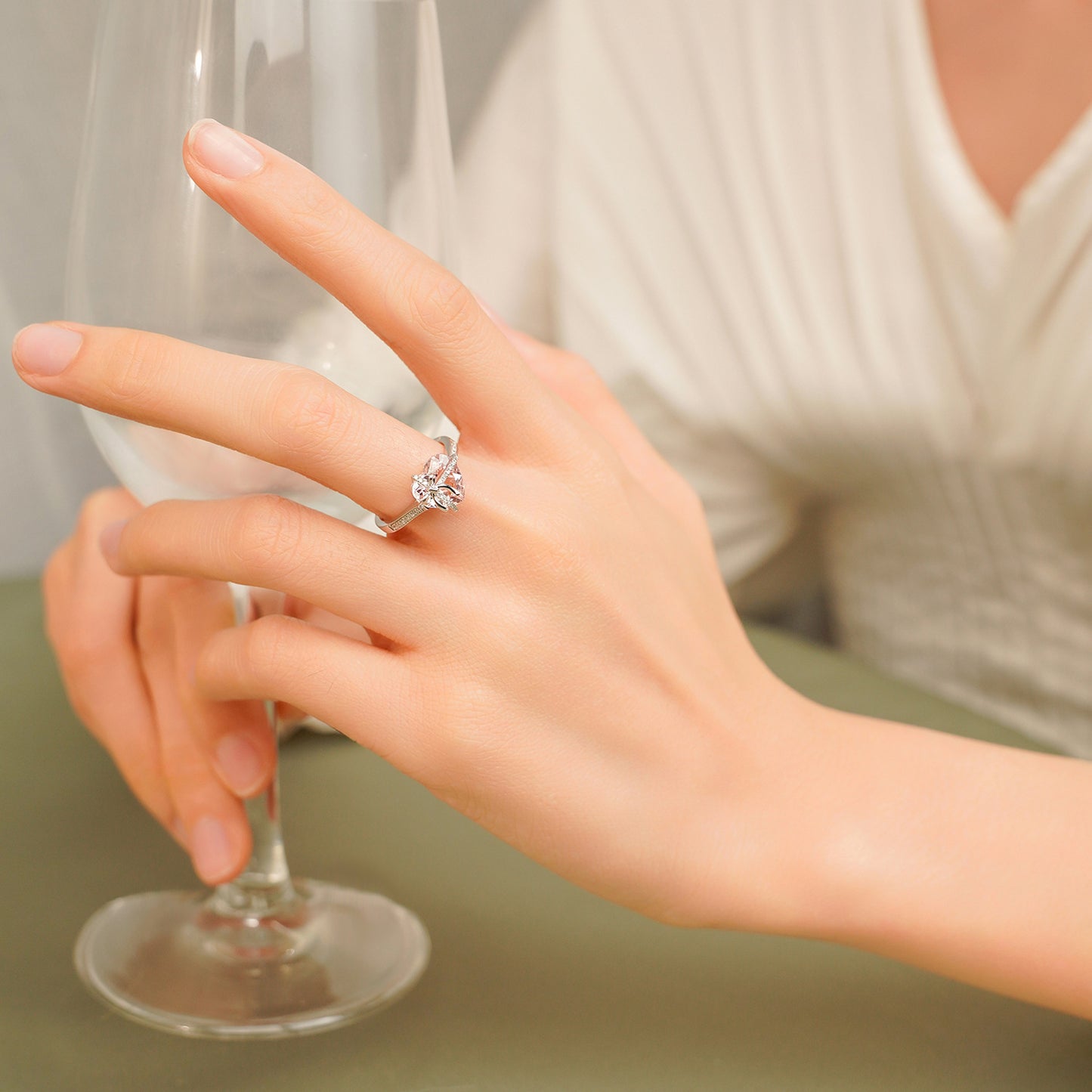 The Tied with Love Ring is a masterpiece of high-design fairy aesthetics, featuring a stunning heart-shaped pink diamond elegantly bound by a shimmering zircon-encrusted knot. 