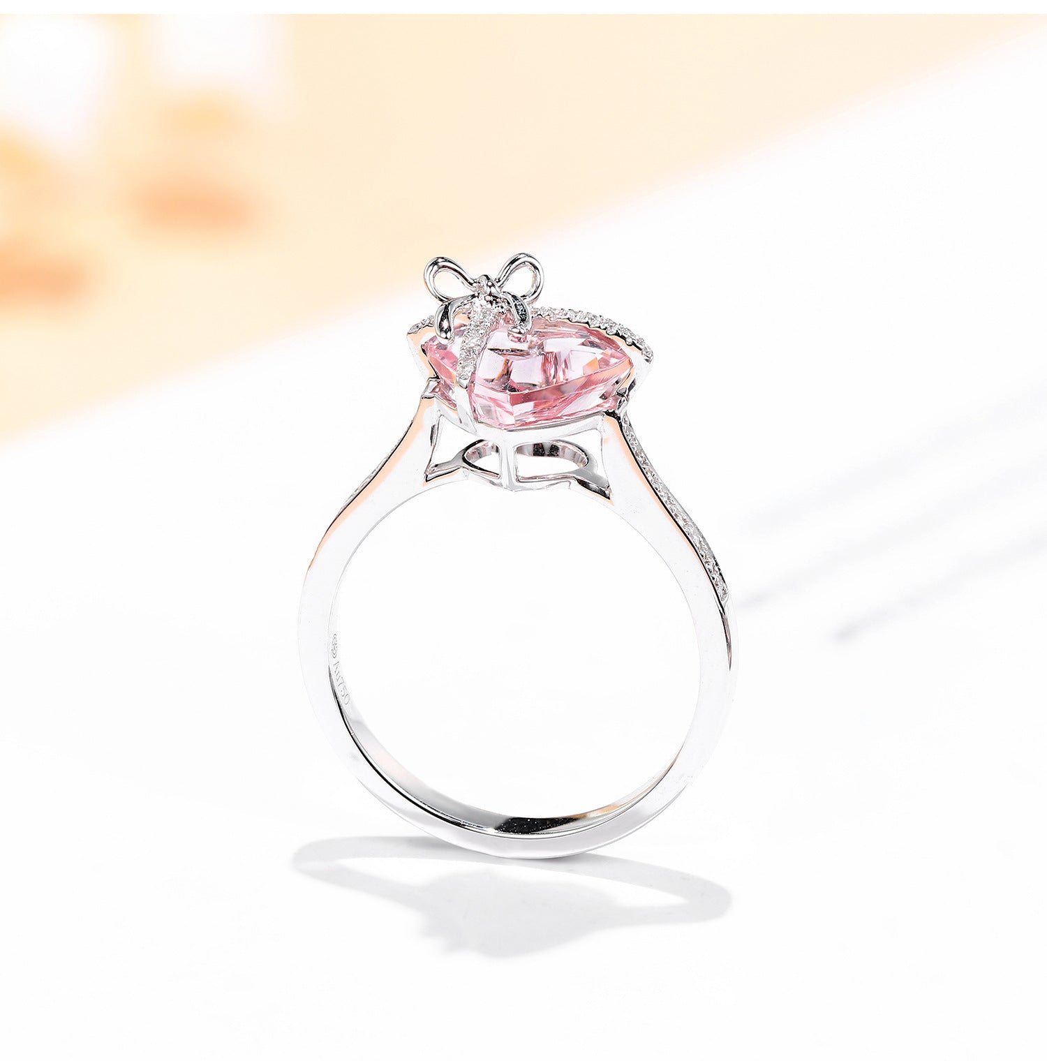 The Tied with Love Ring is a masterpiece of high-design fairy aesthetics, featuring a stunning heart-shaped pink diamond elegantly bound by a shimmering zircon-encrusted knot. 